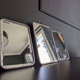 three barber mirrors