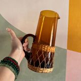 Vintage orange and wicker carafe