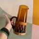 Vintage orange and wicker carafe