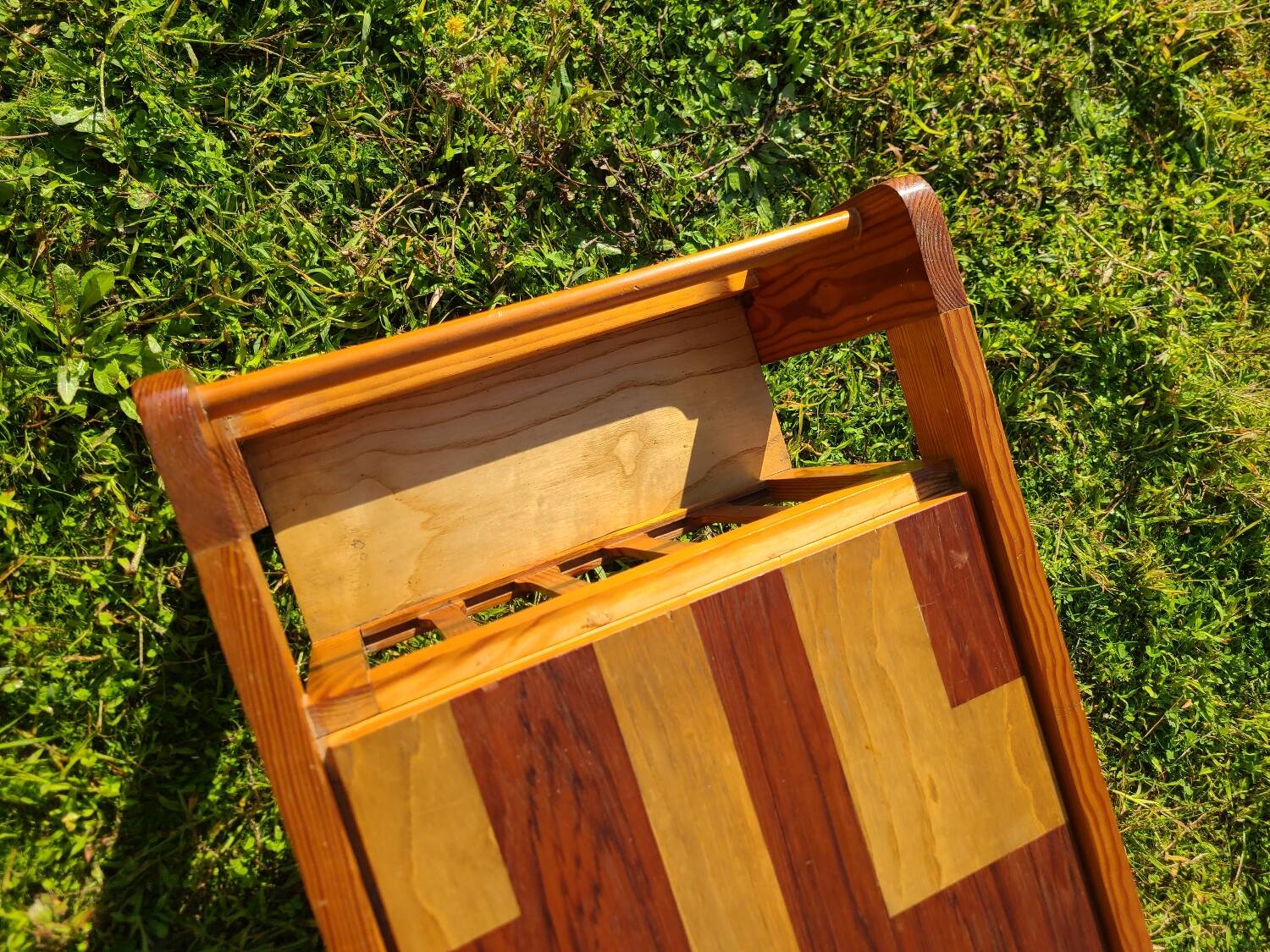 Pine coffee table, 1970s marquetry top, vinyl record rack.