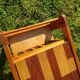 Pine coffee table, 1970s marquetry top, vinyl record rack.