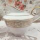 Ensemble pot à lait et crémier en porcelaine de Limoges