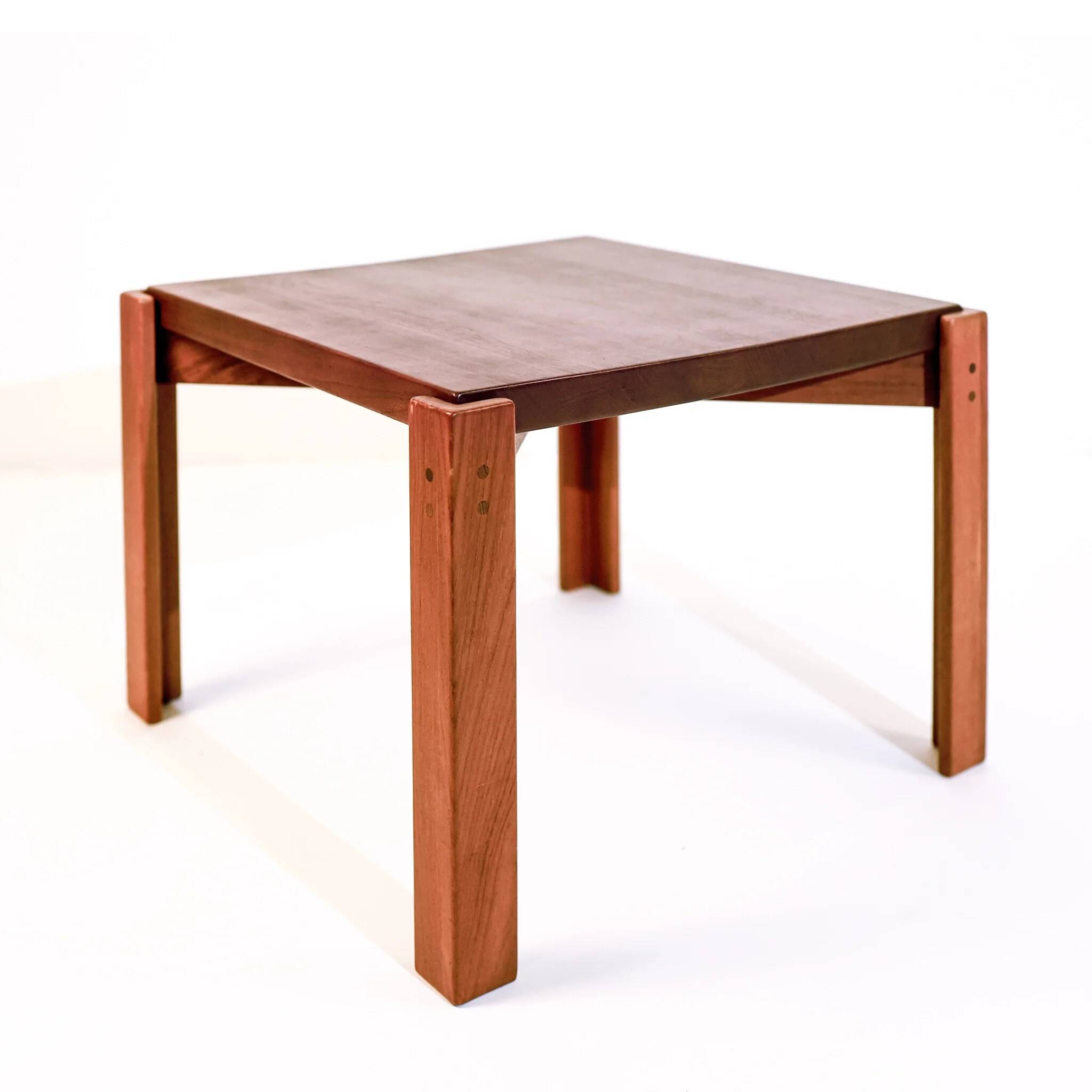 Vintage coffee table with a teak top by Jens Quistgaard, concave top, Denmark, 1960s.