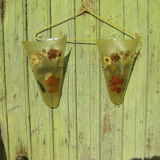 Pair of vintage resin sconces with vegetable inclusion