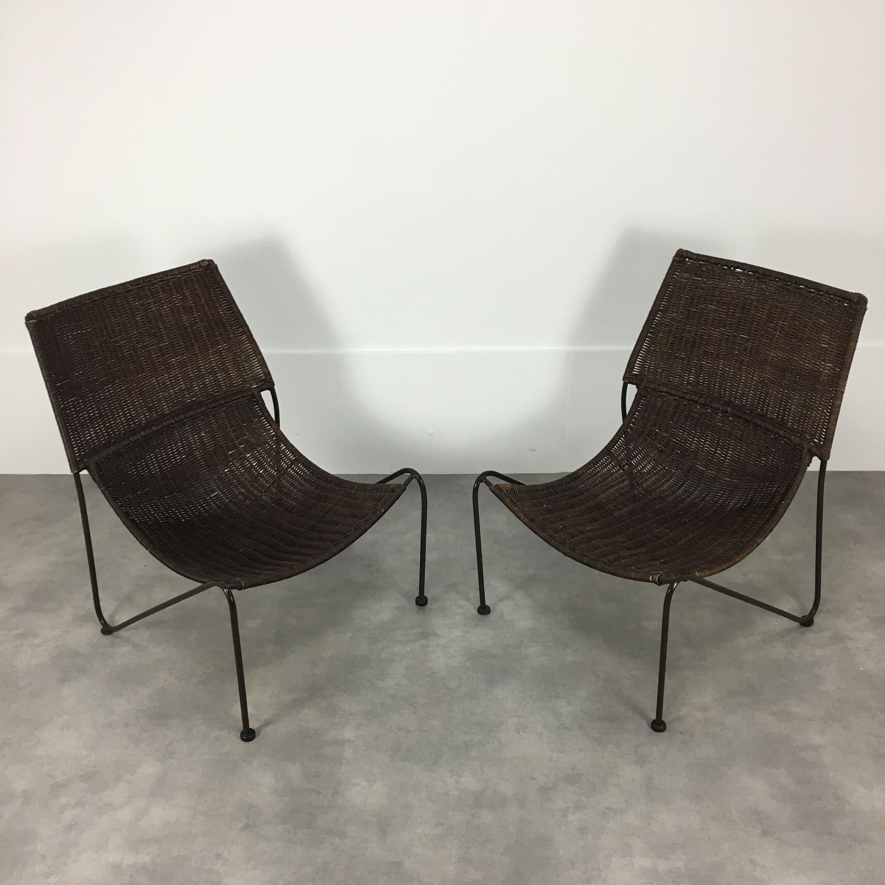 Pair of rattan and steel wire armchairs by frederick weinberg