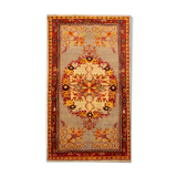 Handwoven orange wool area rug 85x155cm