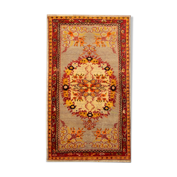 Handwoven orange wool area rug 85x155cm