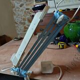 Articulated blue desk lamp