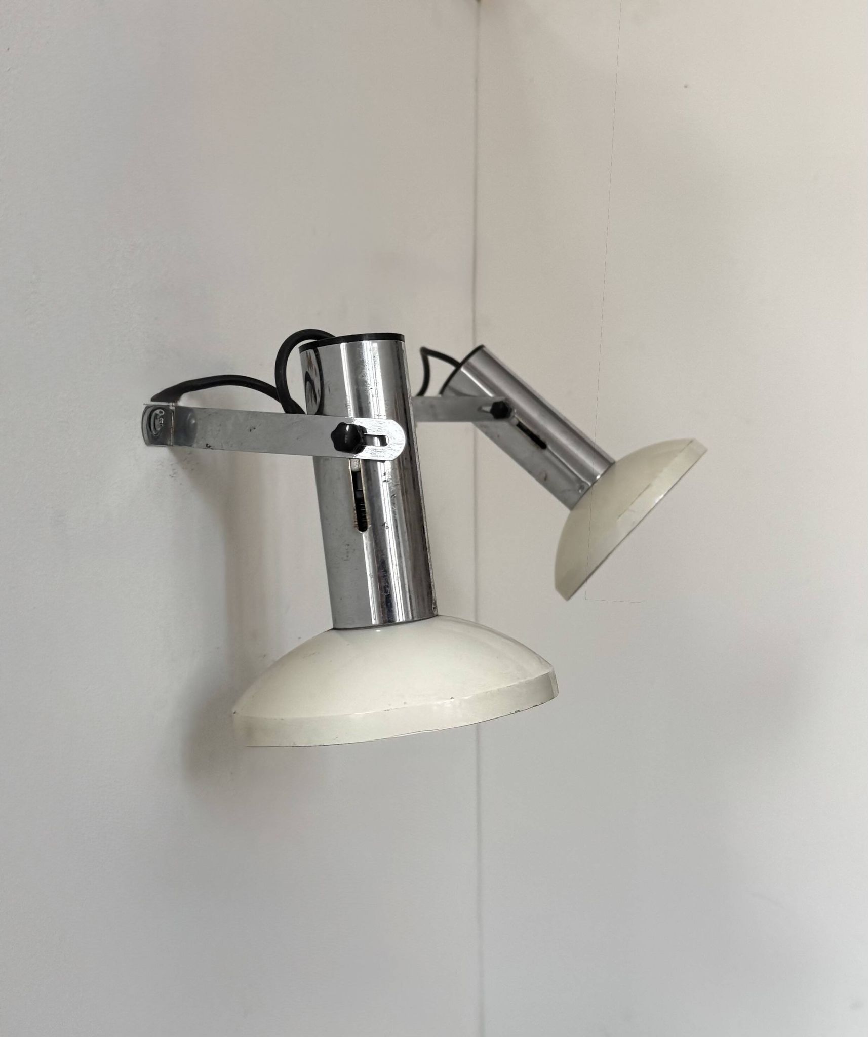 Pair of vintage adjustable wall lights, chrome and white lacquered metal, France 70