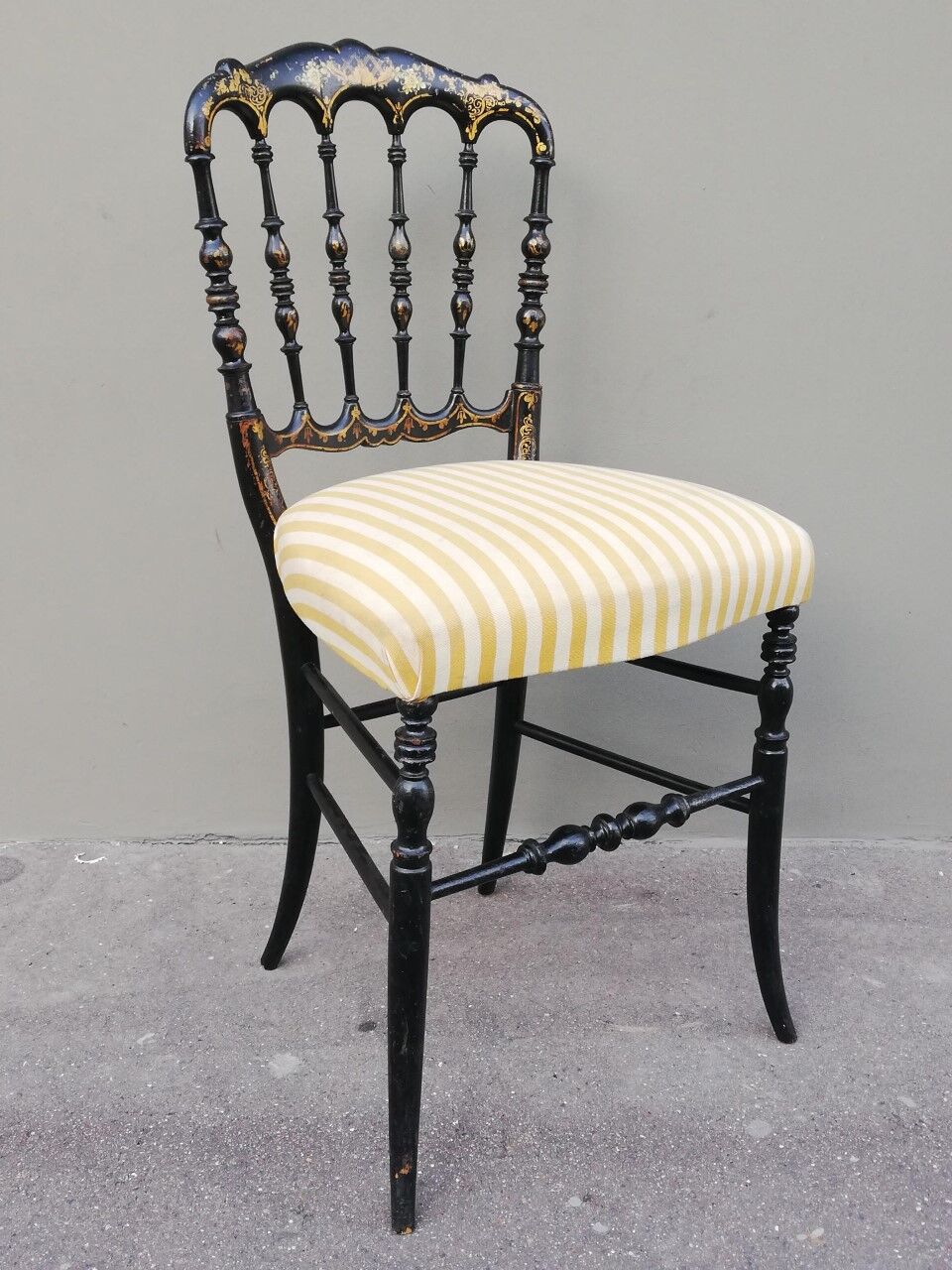 Napoleon III chair late 19th in blackened wood with gilded patterns