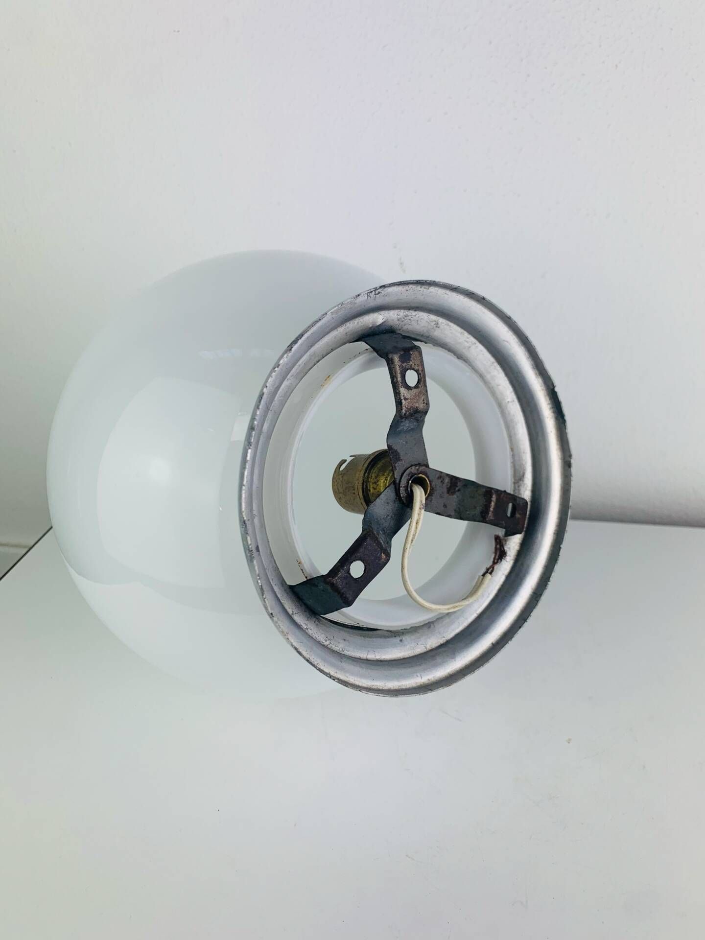 Wall light or ceiling light with opaline globe in Art Deco style.