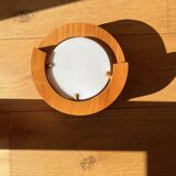 Round pine and plexiglass wall light, 1970