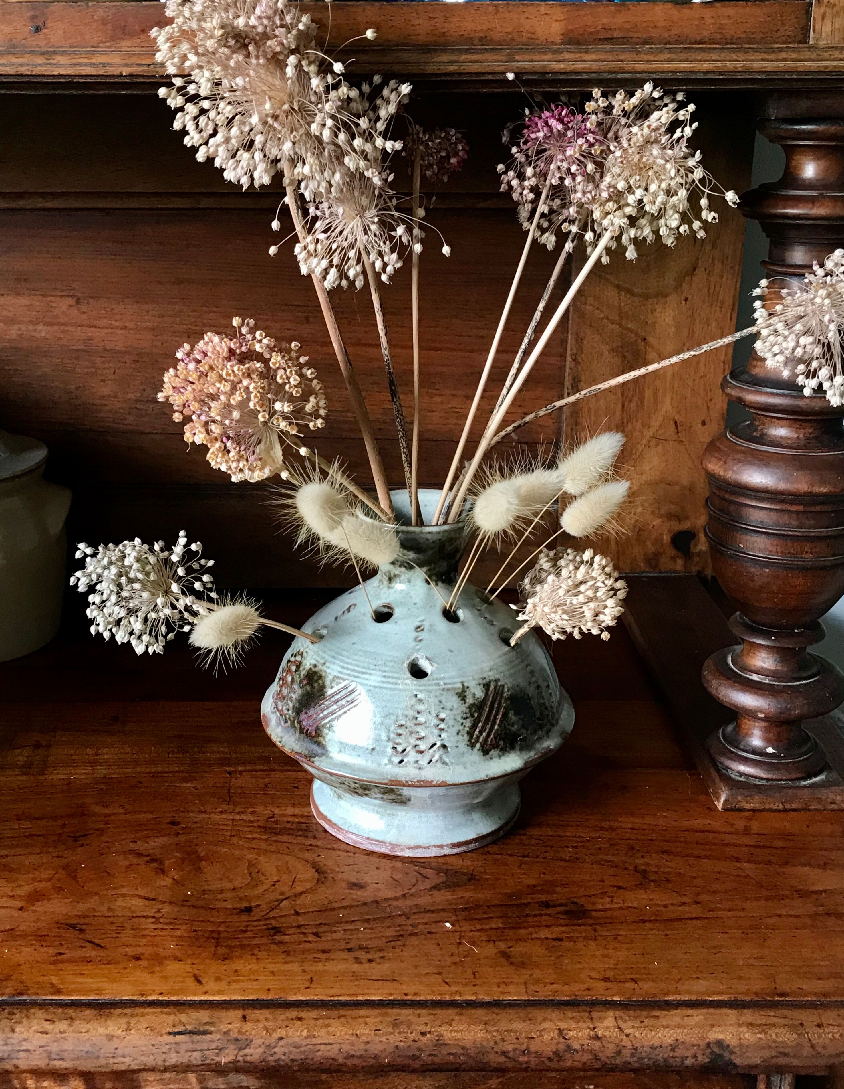 Signed ceramic flower-picker vase