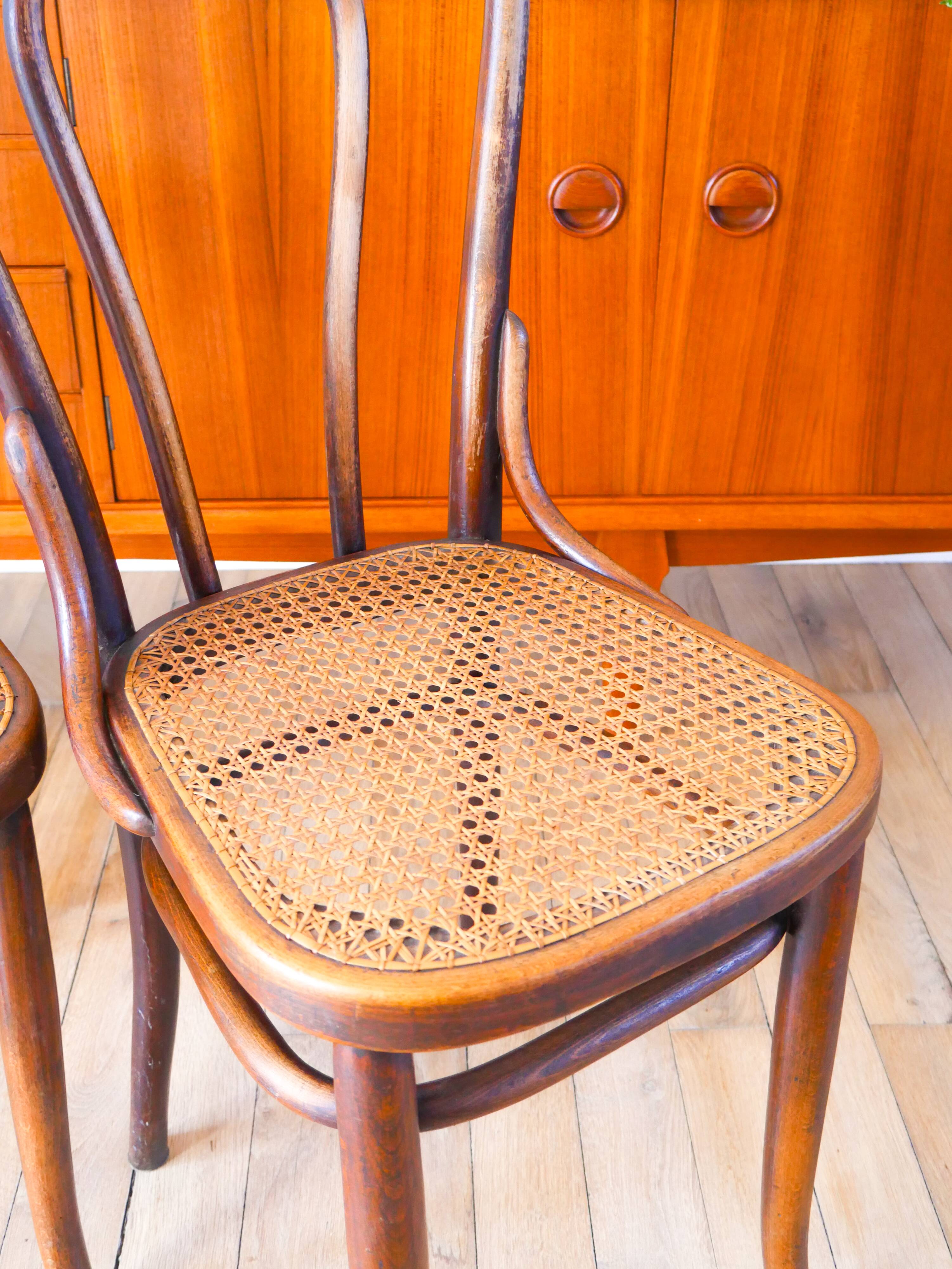 Set of 3 bistro chairs in wood and canework signed J. Kohn, Made in Austria, 20th century