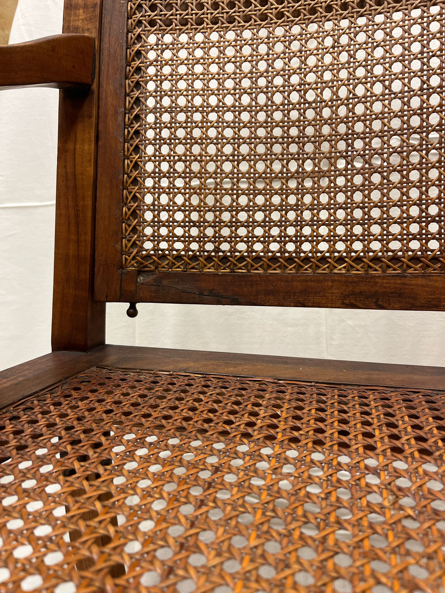 Caned armchair