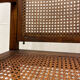Caned armchair