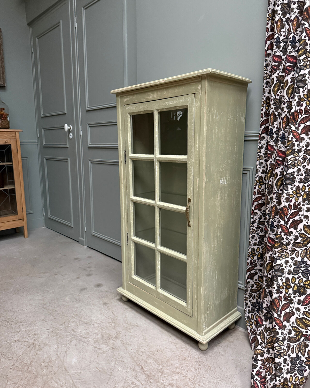 Small patinated display cabinet