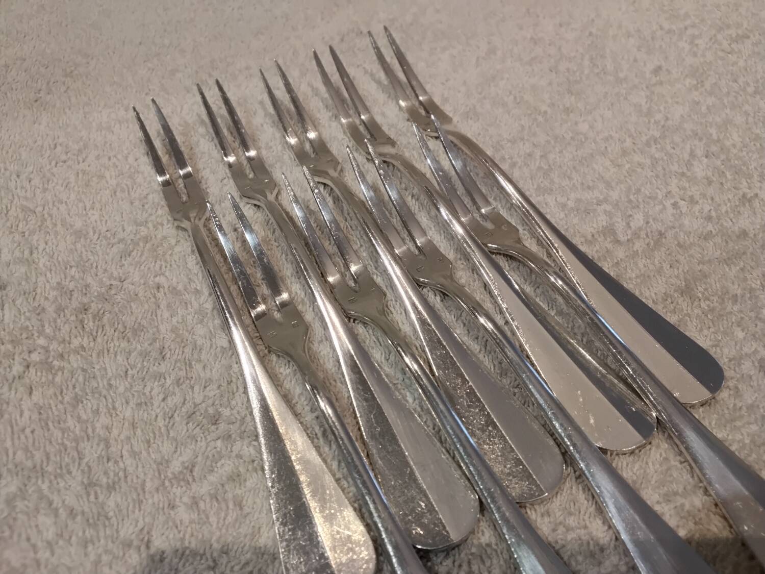 9 silver-plated snail forks by silversmith J Brille, 15.9 cm