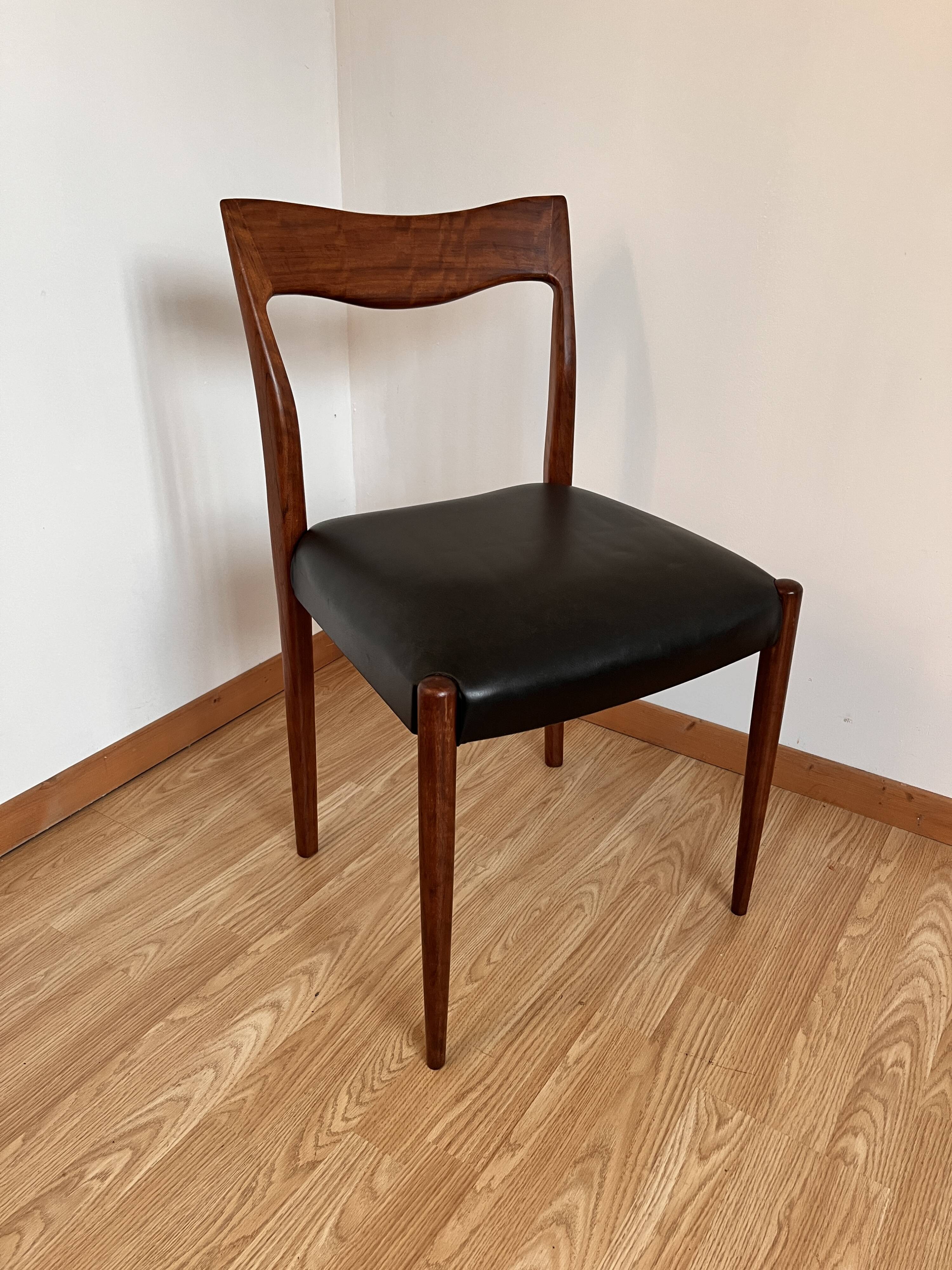8 Scandinavian teak dining chairs