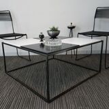 Square coffee table has checkered 80s