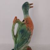 Water jug in slipware from the 1960s. Decorated with a coloured duck. Unmarked.