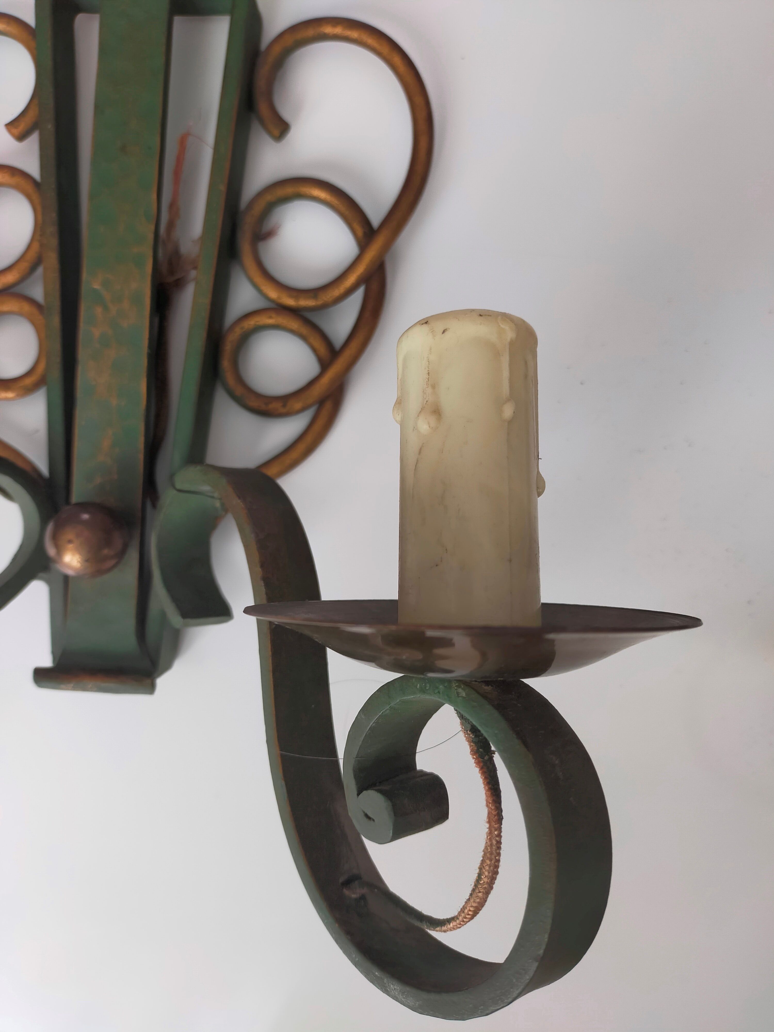 Pairs of vintage wrought iron wall lamps
