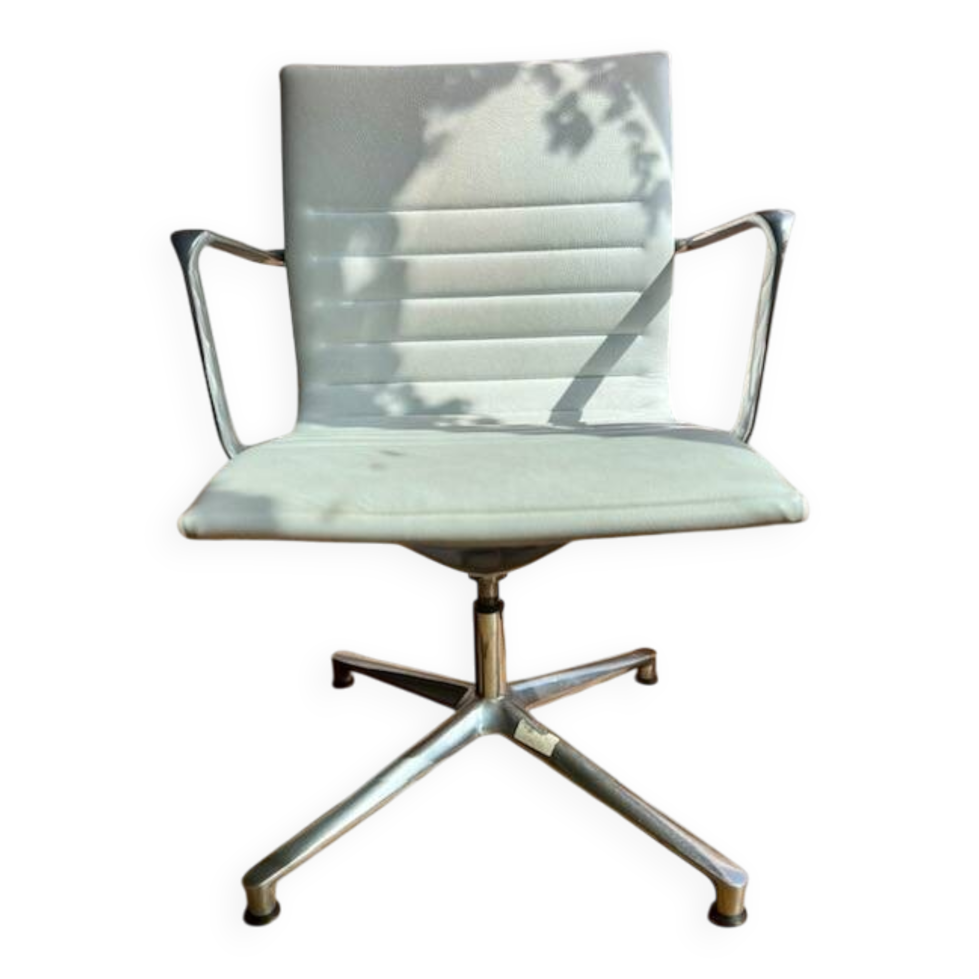 ICF armchair in white leather, four-star base on glides
