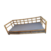 Grande banquette lit en rotin vintage