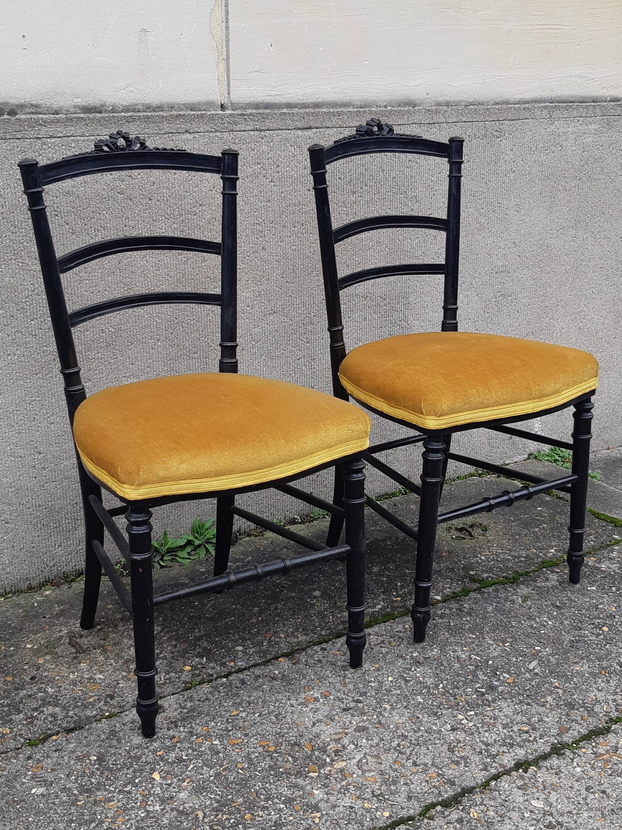 Pair of blackened wood Napoleon III chairs