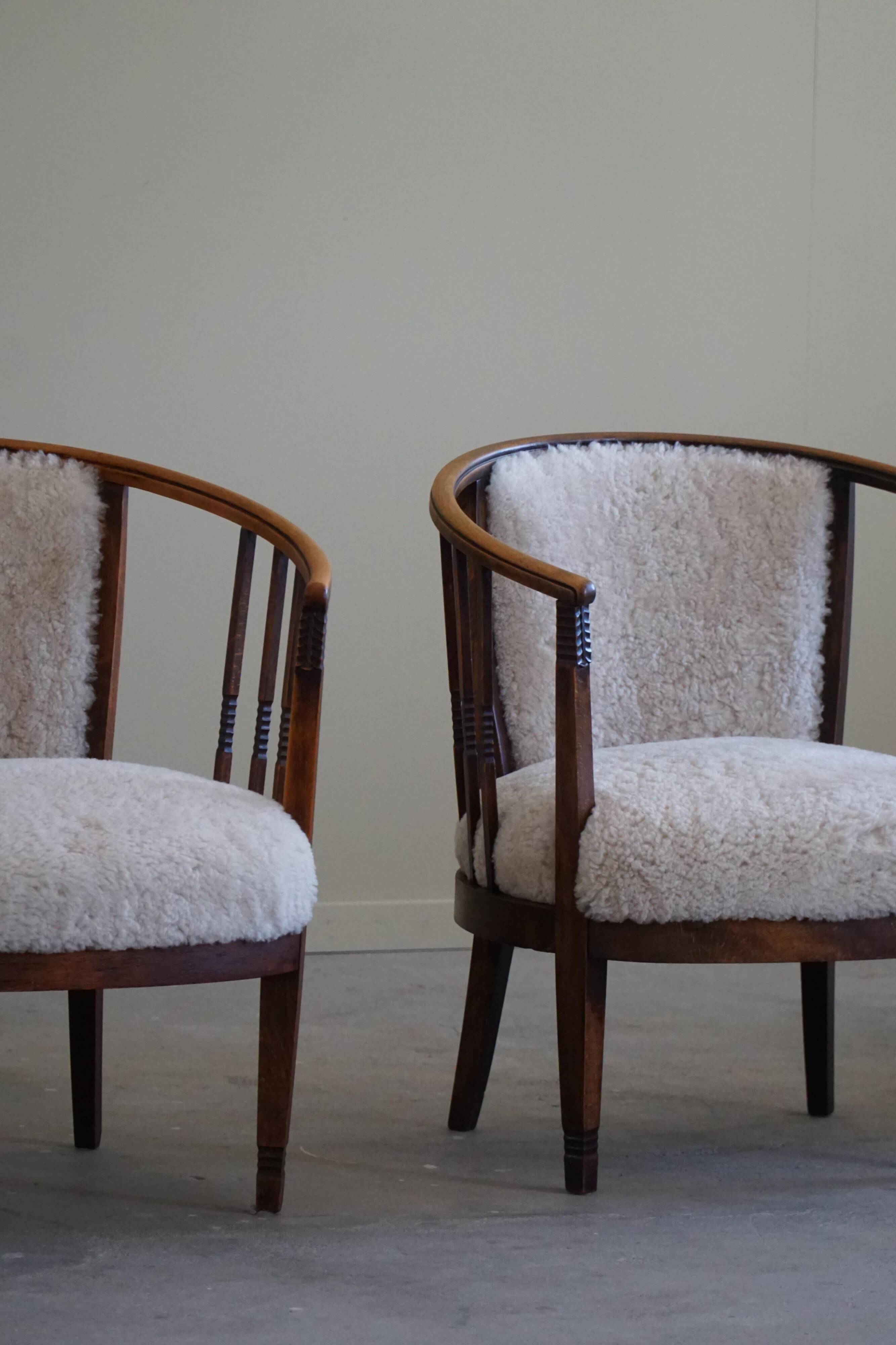 Pair of Danish armchairs in beech, reupholstered in lambswool, Art Nouveau, 1900s.
