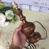 Turned wooden foot lamp with pleated lampshade