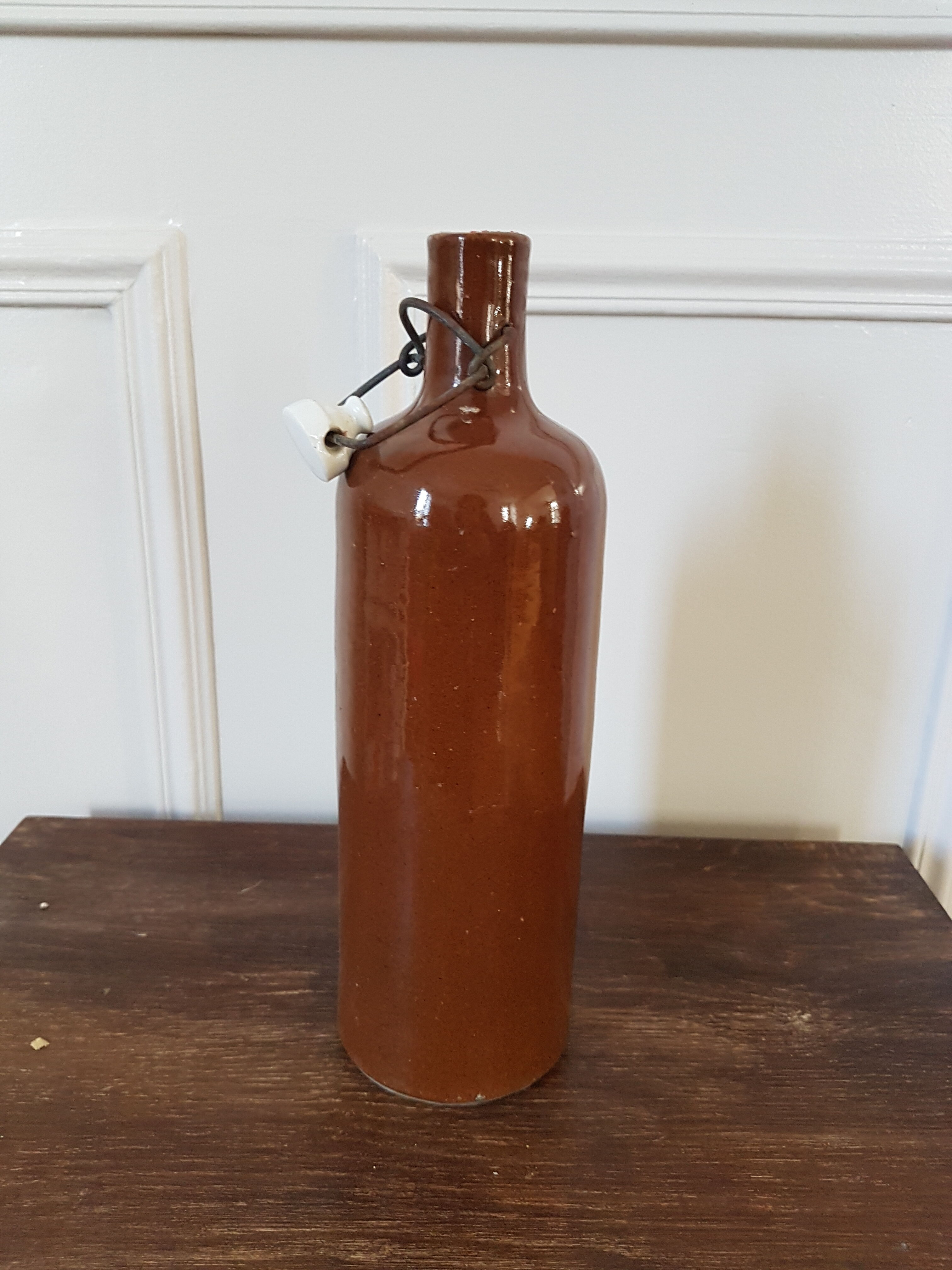 Enamelled stoneware bottle