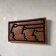 Bas relief cadre bois motifs visages