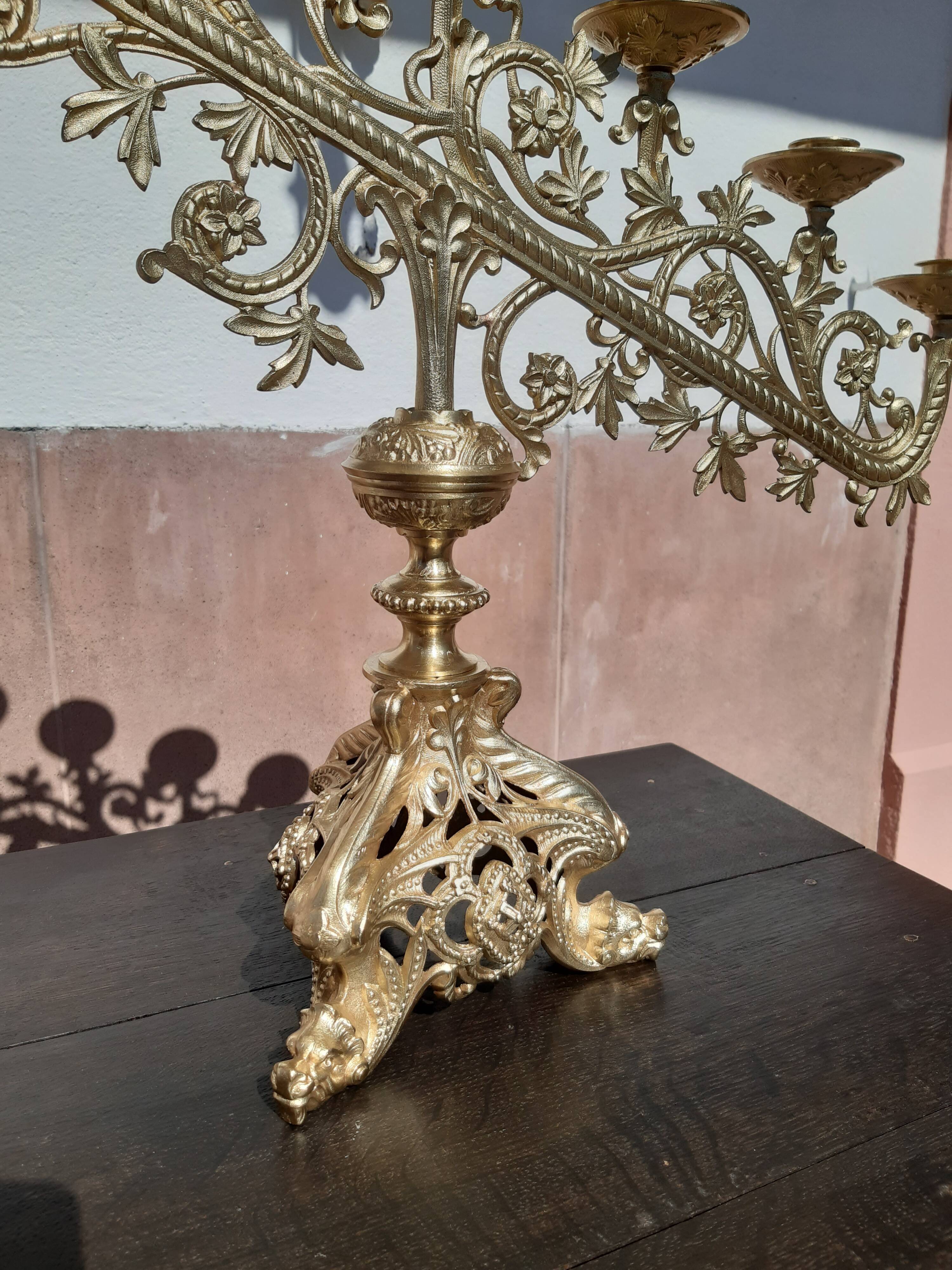 Antique candle holder in bronze and brass nineteenth century.