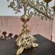 Antique candle holder in bronze and brass nineteenth century.