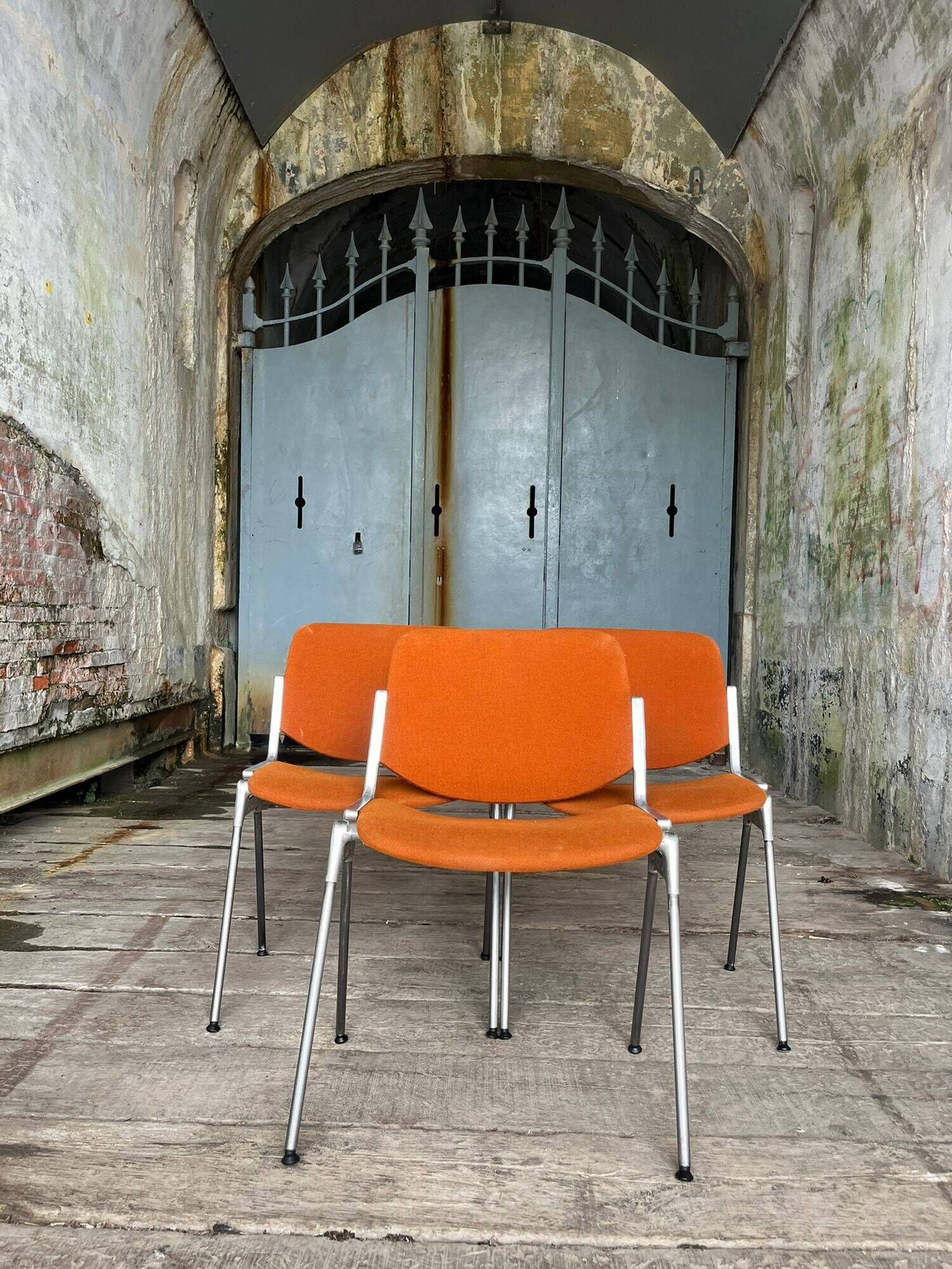 DSC 106 chair in orange by Giancarlo Piretti for Castelli, 1970s.