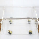 Transparent thermoformed plexi coffee table, on wheels