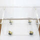 Table basse en plexi thermoformé transparent, sur roulettes