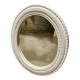 Oval white mirror