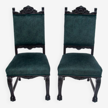 A pair of antique chairs on lion's paws, Western Europe, circa 1920.