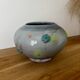 Magnificent pot or vase, handcrafted pottery with flowers, signed on the back.