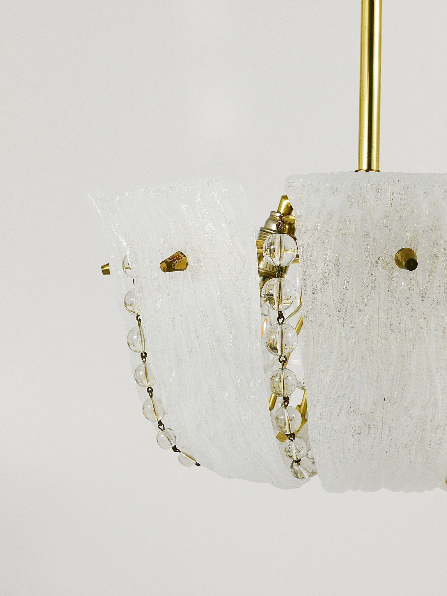 J.T. Kalmar Petite curved suspension basket, brass and glass, Austria, 1950s