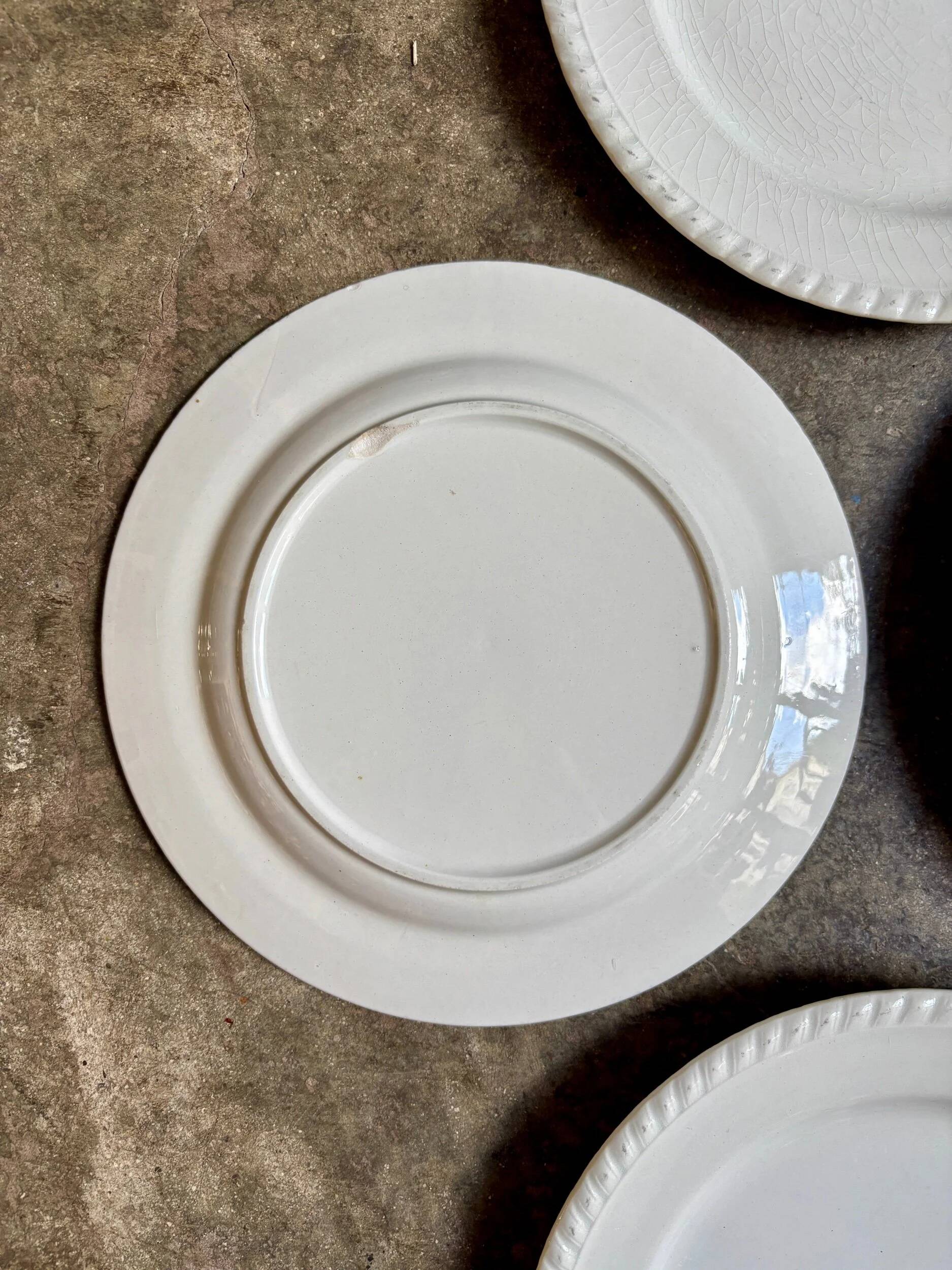4 white earthenware dessert plates