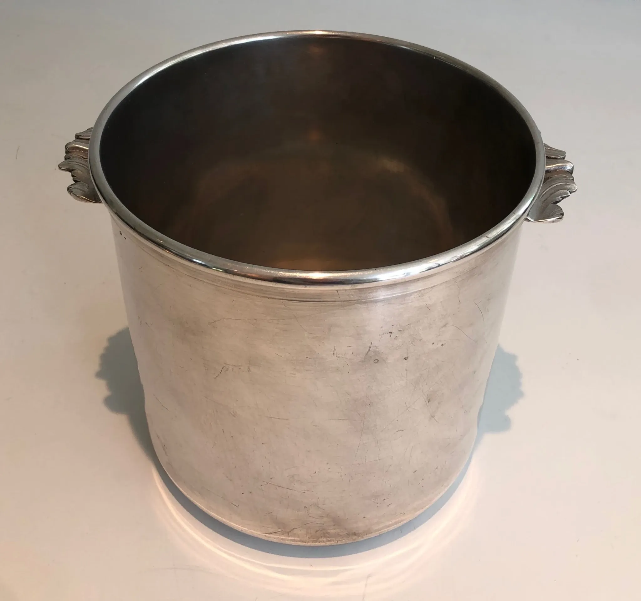 Cylindrical Silver-Plated Champagne Bucket with Small Leaf-Shaped Handles.