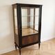 Art Deco display cabinet in wood and black lacquer
