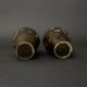 Pair of Japanese vases in chiselled bronze with inlaid bird decoration.