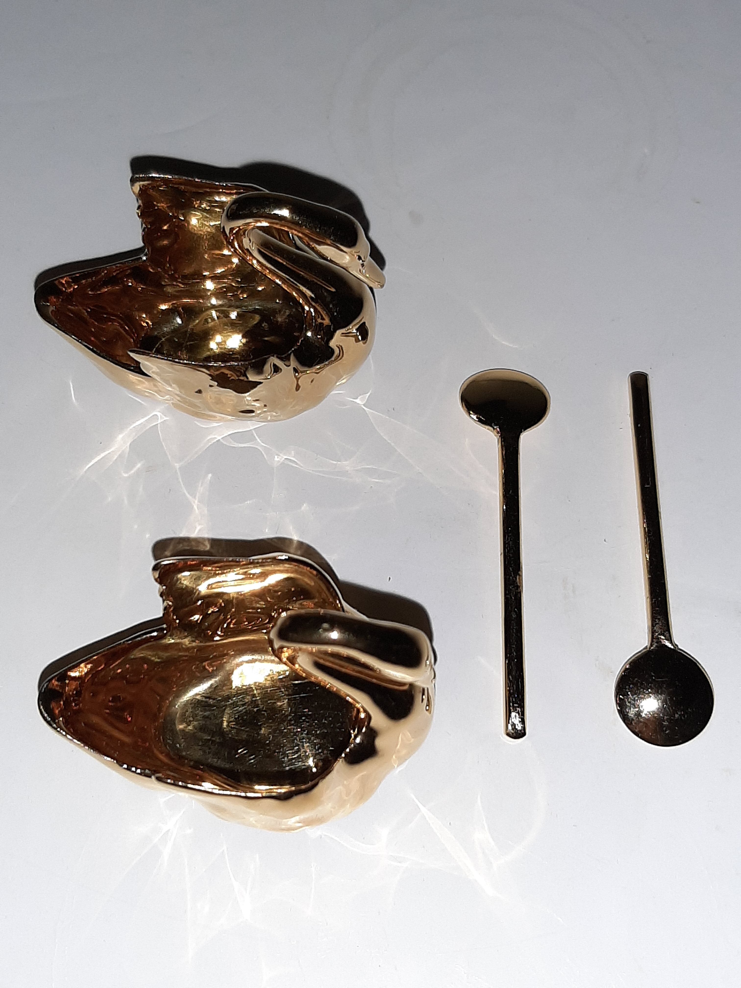 Pair of salerons Golden porcelain swans