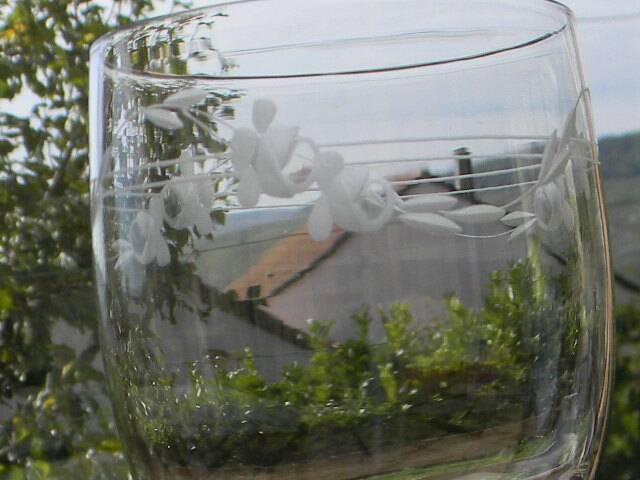 Set of 8 antique glass water glasses. Engraved floral border