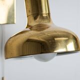 Set of three brass adjustable wall lamps