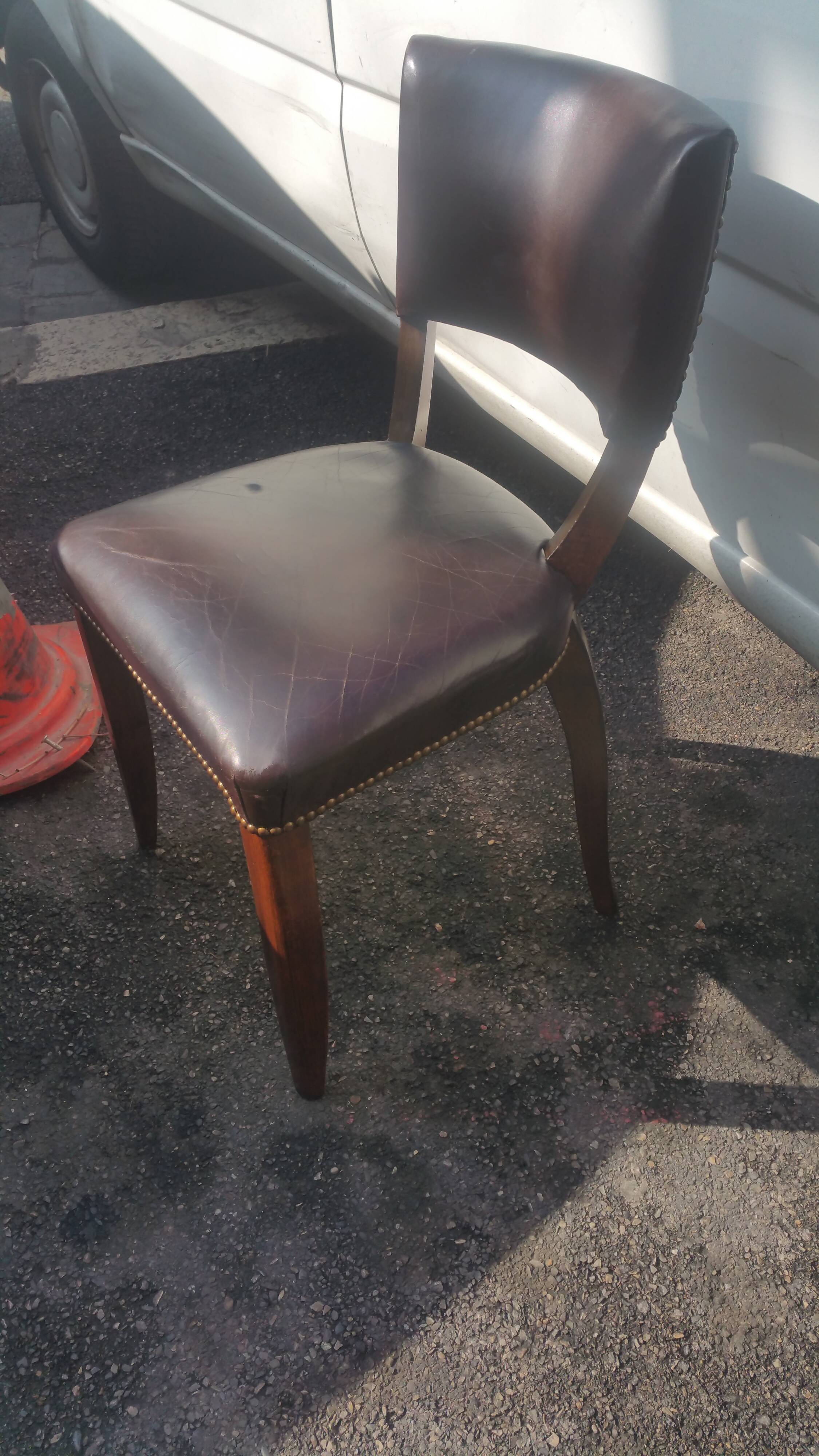Lot of leather and vintage wood chairs